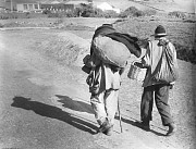 2 men with sacks