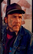 man with tattoo on cheek.jpeg