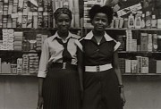 2 women stretch belts no title on verso